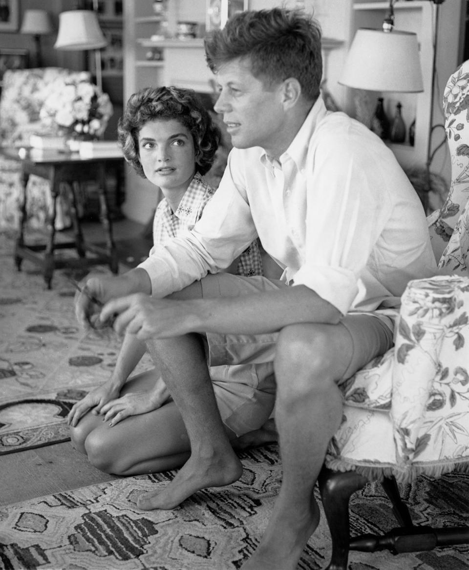 <p>Sen. John F. Kennedy and fiancée Jacqueline Bouvier are interviewed for a Life magazine story while on vacation at the Kennedy compound in June 1953 in Hyannis Port, Mass. (Photo: Hy Peskin/Getty Images) </p>