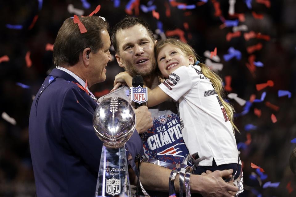 FILE - New England Patriots' Tom Brady holds his daughter, Vivian, after the NFL Super Bowl 53 football game against the Los Angeles Rams, Sunday, Feb. 3, 2019, in Atlanta. Tom Brady has retired after winning seven Super Bowls and setting numerous passing records in an unprecedented 22-year-career. He made the announcement, Tuesday, Feb. 1, 2022, in a long post on Instagram. (AP Photo/Mark Humphrey, File)