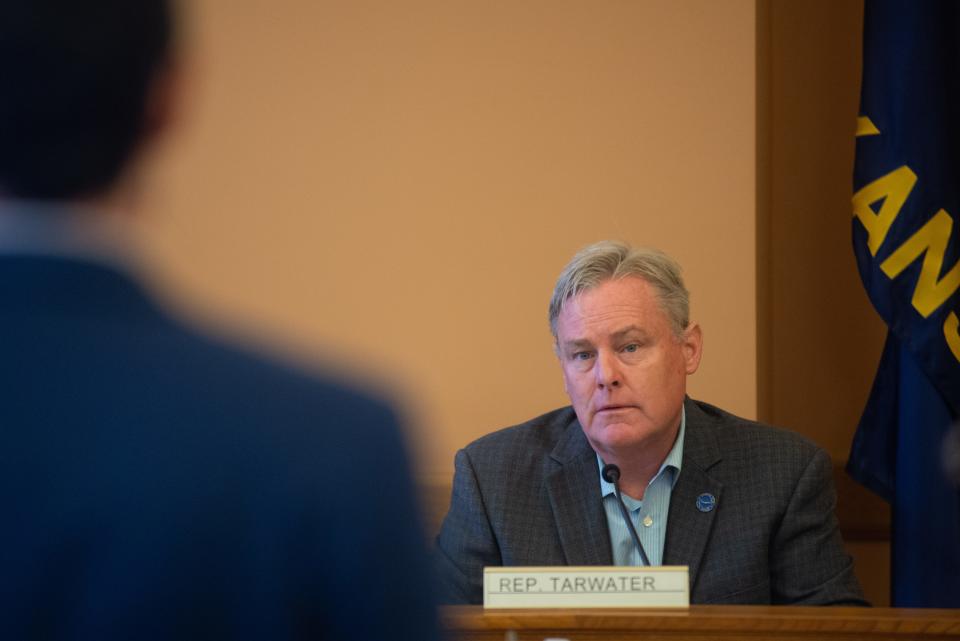 Rep. Sean Tarwater, R-Stilwell, asks Andy Brienzo, auditor for the Office of Legislative Post Audit, a question after his presentation at Thursday's meeting.