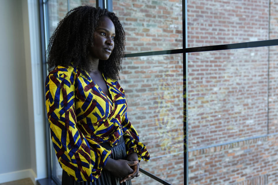 Sophia Danner-Okotie poses for a portrait in her shared workspace Wednesday, Oct. 18, 2023, in Fayetteville, Ga. Sophia Danner-Okotie has ambitious plans for her Nigerian-inspired clothing line but a sense of dread has punctured her optimism as she watches a lawsuit try to take down a small venture capital firm that was instrumental to her boutique brand's growth. (AP Photo/John Bazemore)