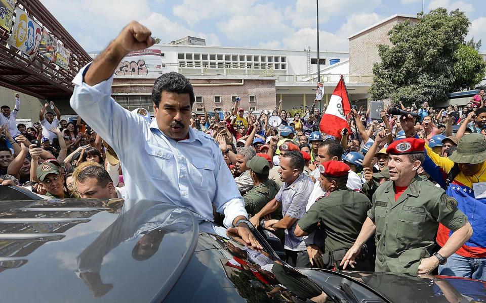 Venezuelan president, Nicolas Maduro. The country is officially in default, credit agencies say - AFP