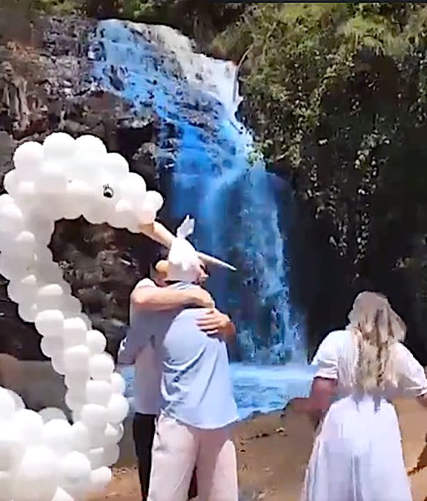 Gender reveal stunt in Brazil turns waterfall blue. (Photo: Screen Shot/Twitter/Vanessa Costa)