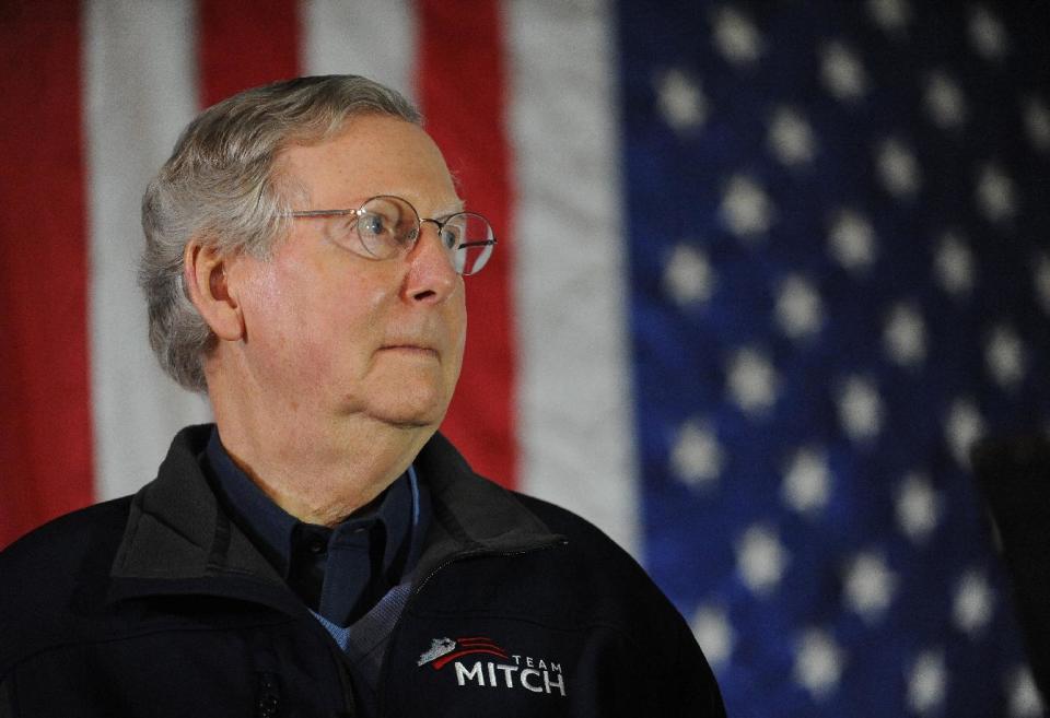 FILE - This Feb. 8, 2014 file photo shows Senate Minority Leader Mitch McConnell of Ky. waiting to speak during a campaign stop at Badgett Supply in Madisonville, Ky. (AP Photo/Stephen Lance Dennee, File)