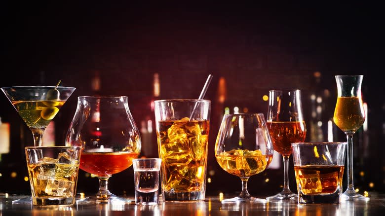 Whiskey in a variety of cocktail glasses