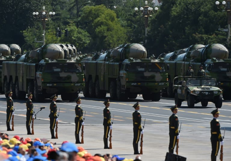 Military vehicles carrying DF-21D anti-ship ballistic missiles take part in a parade at Tiananmen Square in Beijing on September 3, 2015 to mark the 70th anniversary of victory over Japan and the end of World War II