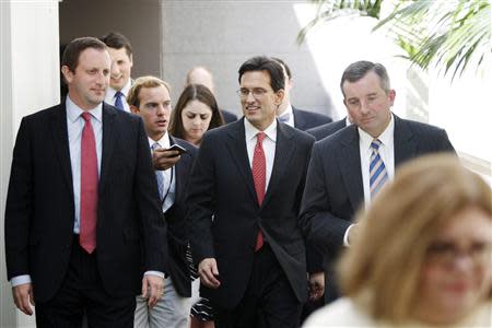 U.S. House Majority Leader Eric Cantor (R-VA) (C) arrives for a meeting with fellow House Republicans at the U.S. Capitol in Washington, September 30, 2013. REUTERS/Jonathan Ernst