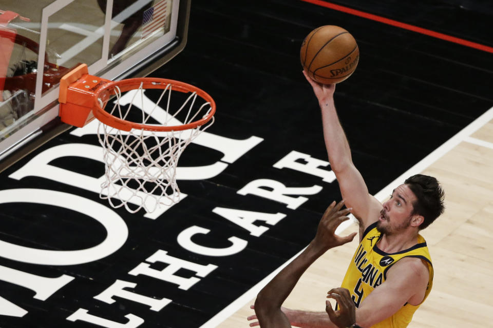 Indiana Pacers guard T.J. McConnell shoots against the Atlanta Hawks during the third quarter of an NBA basketball game Saturday, Feb. 13, 2021, in Atlanta. (AP Photo/Butch Dill)