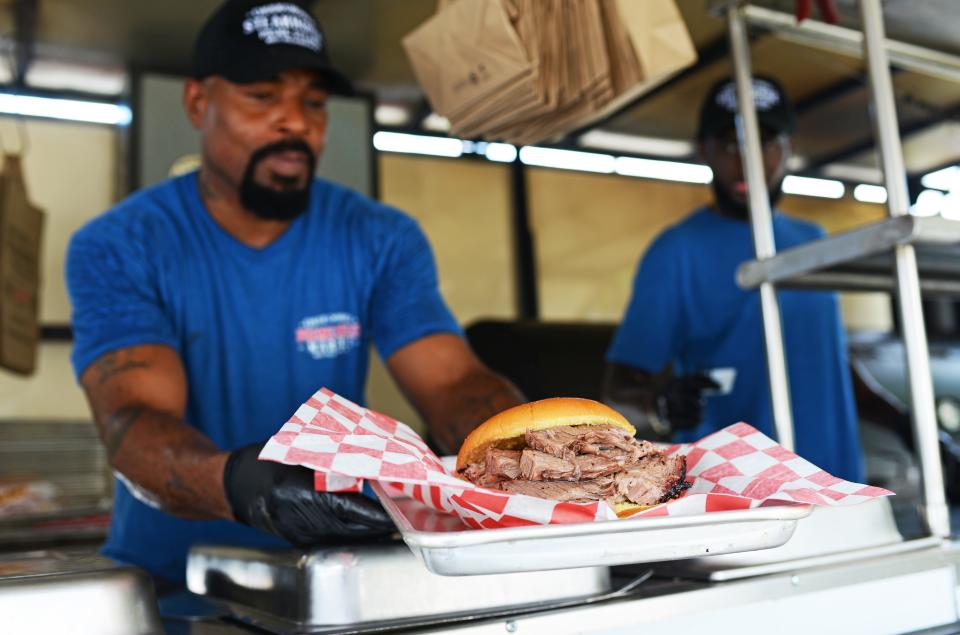 A smoked brisket sandwich is served at Okeechobee Prime Barbecue in West Palm Beach.