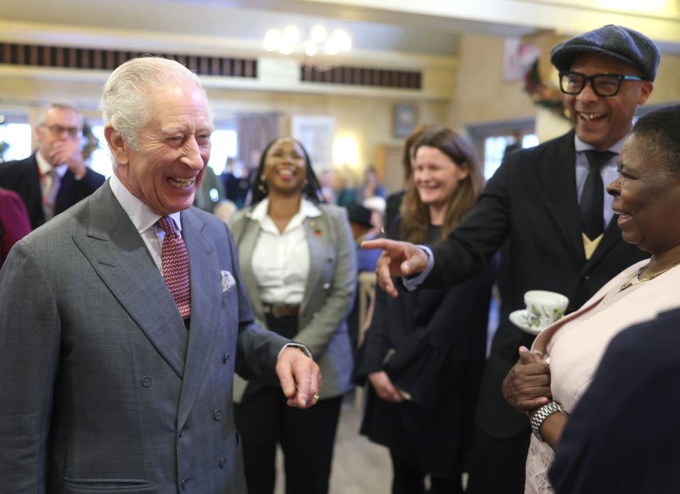 King Charles III talking to Jay Blades during his 75th birthday party at Highgrove Gardens (PA)
