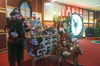 Play around Santa's Workshop with a wonderful display for toys and Christmas goodies.