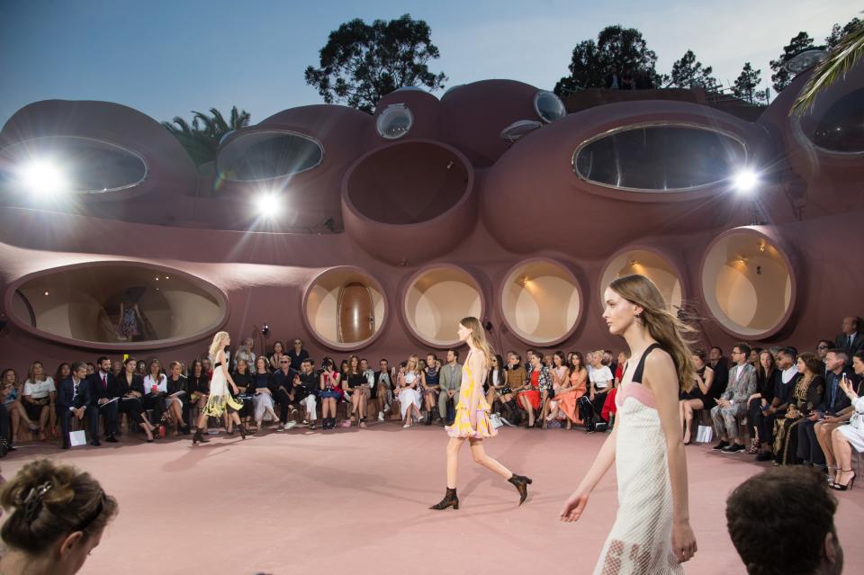 Models walk the runway during a Dior fashion show in 2016.