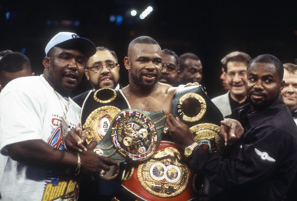 NEW YORK - JANUARY 15:  Roy Jones Jr. celebrates after he defeated David Telesco for the WBA, WBC and IBF light heavyweight titles on January 15, 2000 at the Radio City Music Hall in the Manhattan borough of New York City. Jones won the fight with a unanimous decision in 12 rounds. (Photo by Focus on Sport/Getty Images)