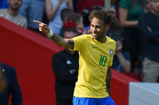 Brazil striker Neymar celebrates after scoring against Croatia