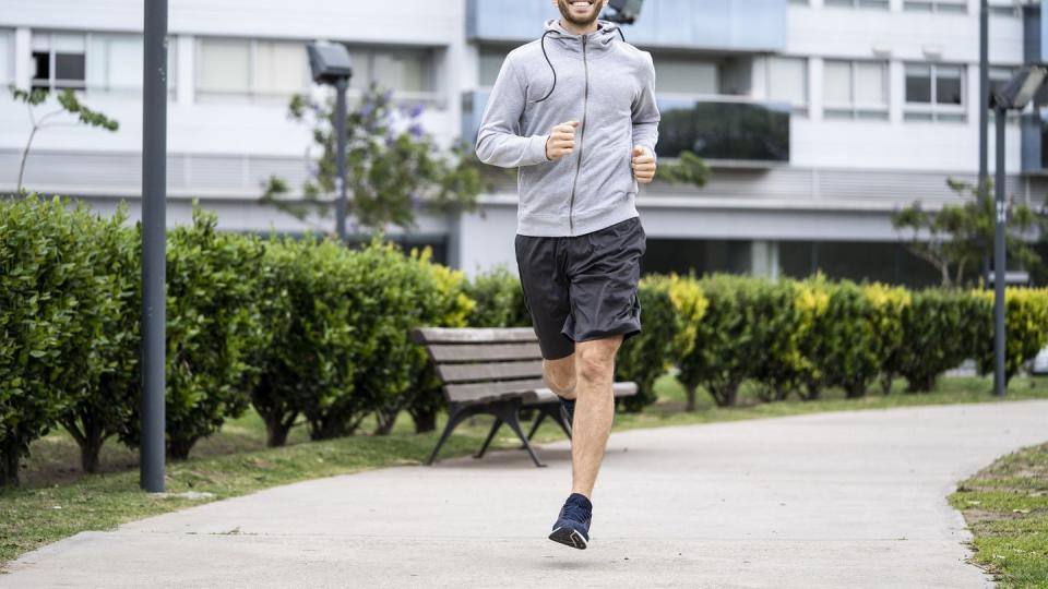young man jogging in park