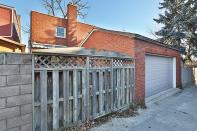 <p>The home’s garage is accessed from a back alley. (Zoocasa) </p>