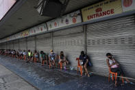 MANILA, PHILIPPINES - APRIL 1: People wait on a queue by keeping social distance for entering the grocery mall at Divisoria public market in Manila, Philippines on April 01, 2020. Several places in Metro manila becomes empty as the government implemented the lockdown due to coronavirus outbreak wherein the number of confirmed cases of COVID-19 is still growing in the Philippines. (Photo by Dante Diosina JR/Anadolu Agency via Getty Images)
