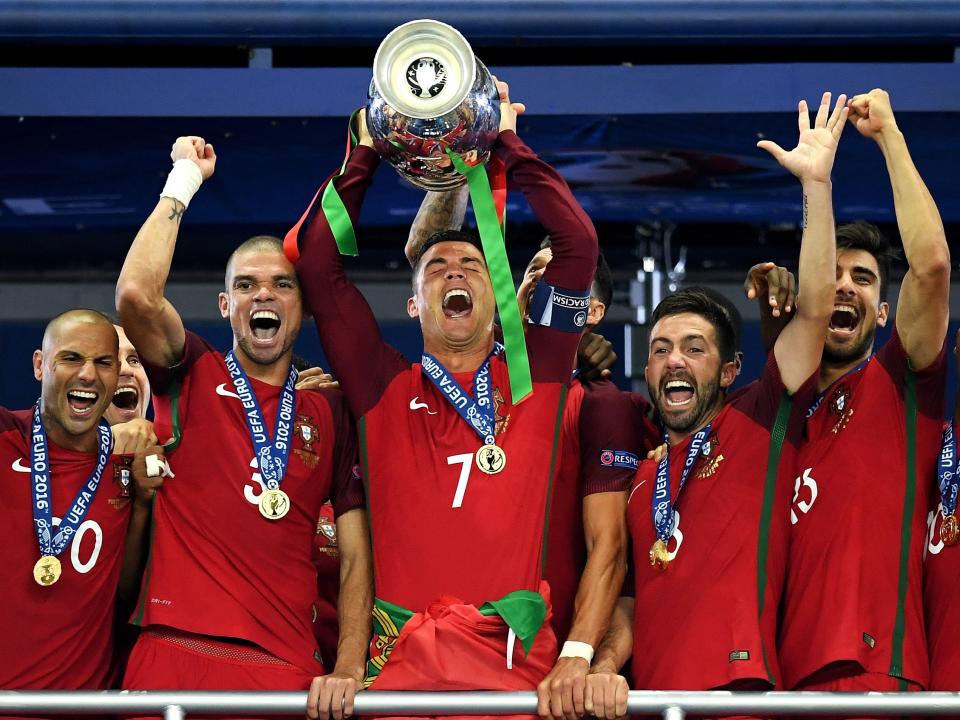 Cristiano Ronaldo, the Portugal captain, lifts the Henri Delaunay trophy in Paris five years ago (Getty)