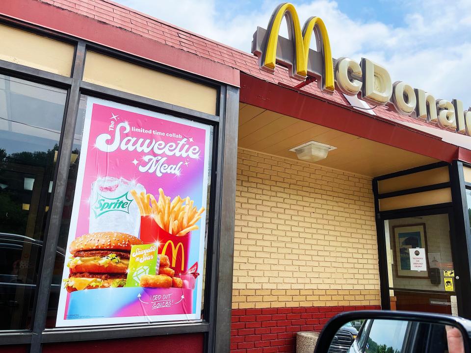 exterior of mcdonalds restaurant with sign advertising new saweetie meal