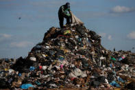 A man works at 'Lixao da Estrutural', Latin America's largest rubbish dump, in Brasilia, Brazil, January 18, 2018. Picture taken January 18, 2018. REUTERS/Ueslei Marcelino