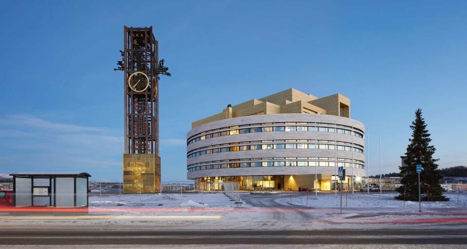 The new City Hall in Kiruna's relocated city center.&nbsp;To tie the old in with the new, the clocktower previously perched on top of the old City Hall has been moved beside it. (Photo: Hufton+Crow)