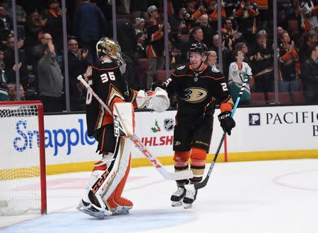 Dec 12, 2018; Anaheim, CA, USA; Anaheim Ducks right wing Ondrej Kase (25) celebrates with goaltender John Gibson (36) after scoring his third goal for his first career hat track in the third period against the Dallas Stars at Honda Center. The Ducks defeated the Stars 6-3. Mandatory Credit: Kirby Lee-USA TODAY Sports