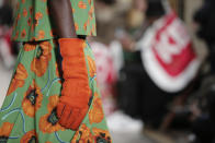 A model wears a creation for the Kenzo fall-winter 22/23 men's collection, in Paris, Sunday, Jan. 23, 2022. (AP Photo/Lewis Joly)