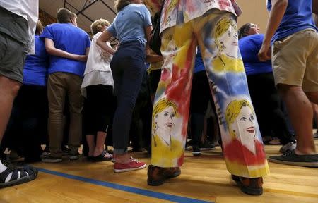 Supporter Gretchen Baer wears an outfit depicting Democratic U.S. presidential candidate Hillary Clinton at a campaign rally at Carl Hayden Community High School in Phoenix, Arizona March 21, 2016. REUTERS/Mario Anzuoni