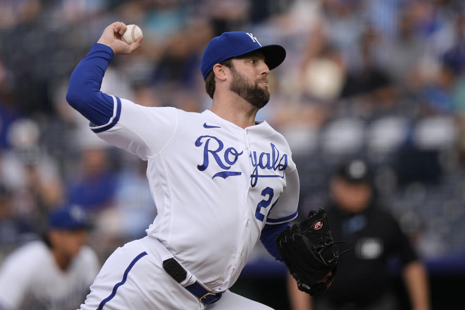 Kansas City Royals starting pitcher Jordan Lyles throws during the first inning of a baseball game against the Cincinnati Reds Tuesday, June 13, 2023, in Kansas City, Mo. (AP Photo/Charlie Riedel)