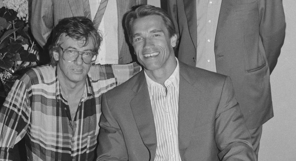 Paul Verhoeven and Arnold Schwarzenegger at Cannes Film Festival in 1988