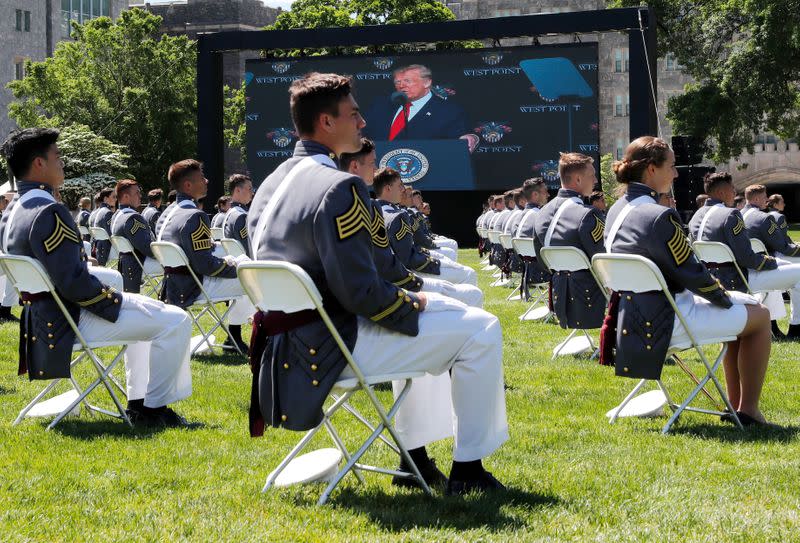 West Point graduating cadets listen to President Donald Trump at 2020 United States Military Academy graduation ceremony at West Point, New York