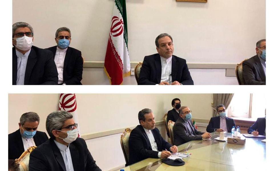 Iranian diplomats attending a virtual talk on nuclear deal with representatives of world powers, in Tehran, Iran - Iranian Foreign Ministry 