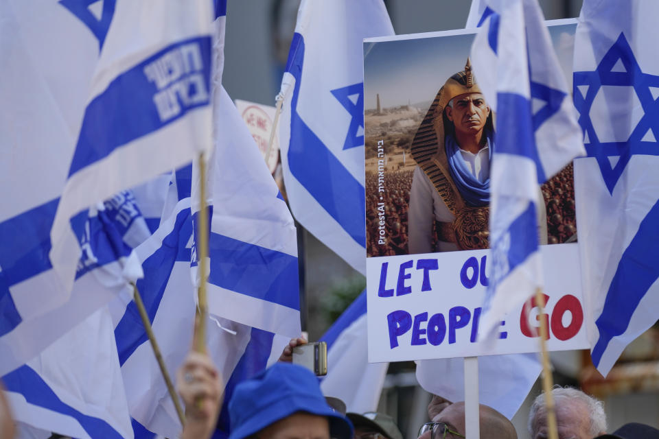 The face of Israeli Prime Minister Benjamin Netanyahu appears on a sign during a protest near the site of a planned meeting between United States President Joe Biden and Netanyahu in New York, Wednesday, Sept. 20, 2023. (AP Photo/Seth Wenig)