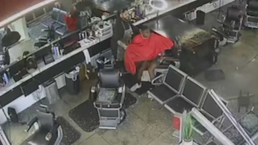 Surveillance video captures the frightening moment a pickup truck crashes through a West Hollywood barber shop, narrowly missing customers inside on Nov. 16, 2023. (Trendsetters Barbershop)