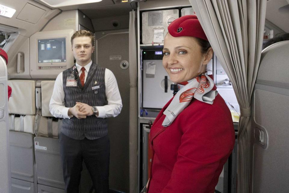 Turkish Airlines cabin crew members are seen doing the final checks before the flight on World Cabin Attendants Day in Ankara, Turkey on May 26, 2022.