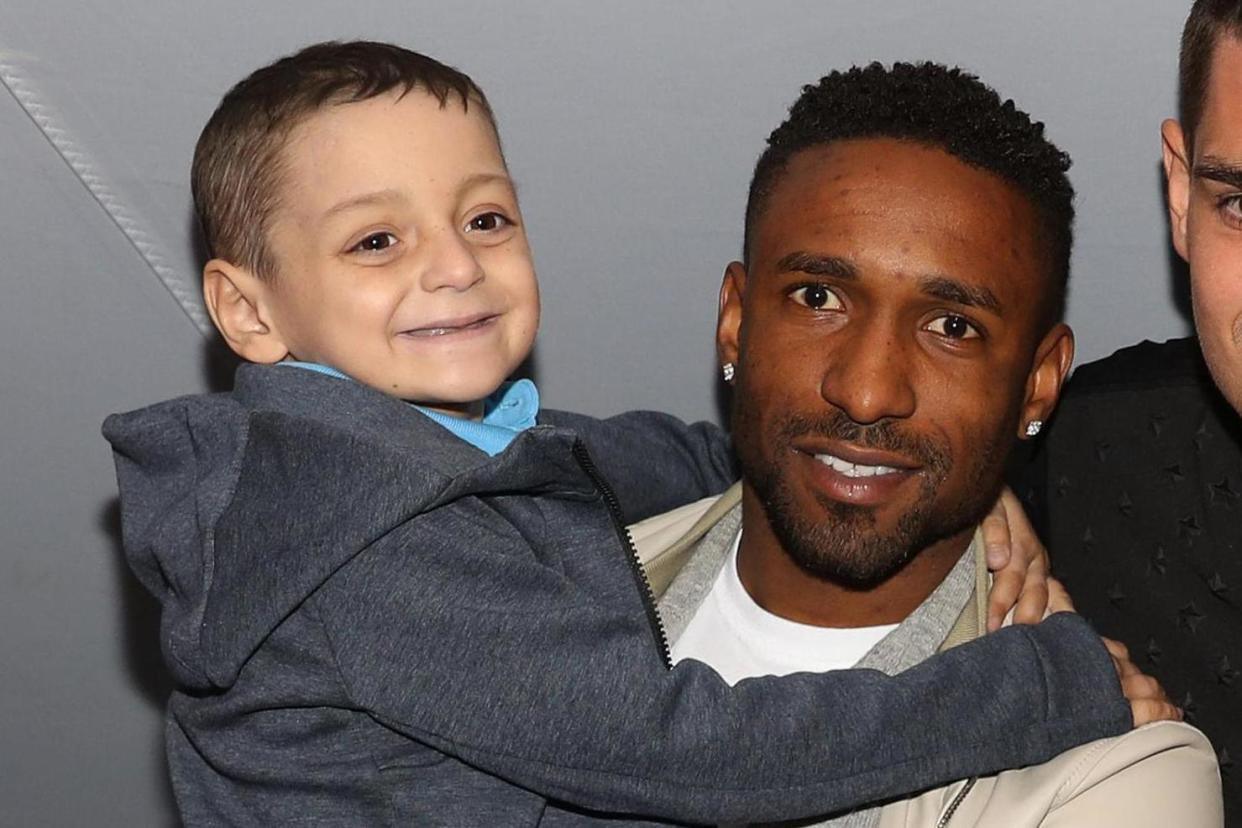 Football star Jermain Defoe with terminally-ill mascot Bradley Lowery: PA