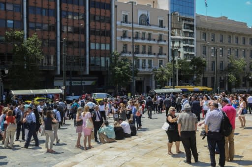 People stood around in central Athens as aftershocks rocked the Greek capital