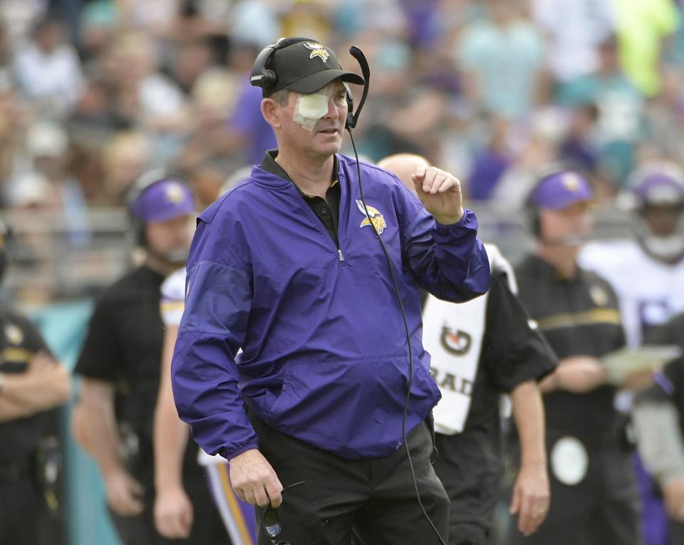 Mike Zimmer’s latest eye surgery will keep him out for the Vikings OTAs this week. (AP)
