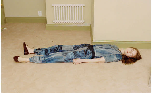 Victoria Beckham models pose dead.