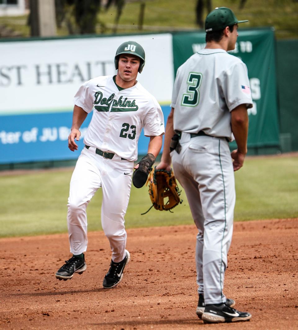 Blake DeLamielleure of Jacksonville University (left) led the Dolphins in hitting this season as a sophomore.