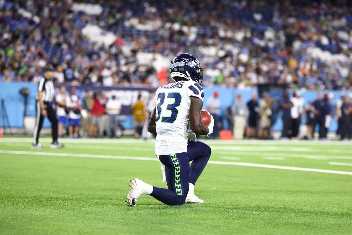 Seahawks rookie return man Dee Williams (33) takes a touchback on a Tennesee kickoff in the fourth quarter of Seattle’s NFL preseason game against the Titans at Nissan Stadium in Nashville Aug. 17, 2024. Casey Gower/USA Today Network/USA TODAY NETWORK