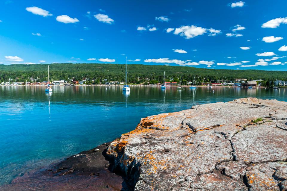 water, greenery and boats in Grand Marais