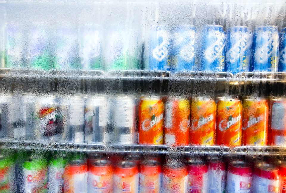 Fizzy drinks will be banned from all NHS hospitals from July (Picture: Rex)