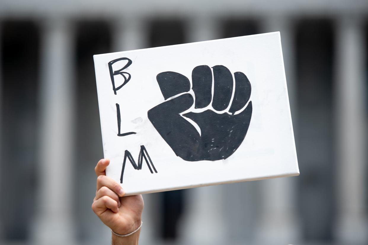 A Black Lives Matter protester in South Carolina in June, 2020. Students and alumni have been calling for a more inclusive atmosphere at Coastal Carolina University since last summer’s protests.  (Getty Images)