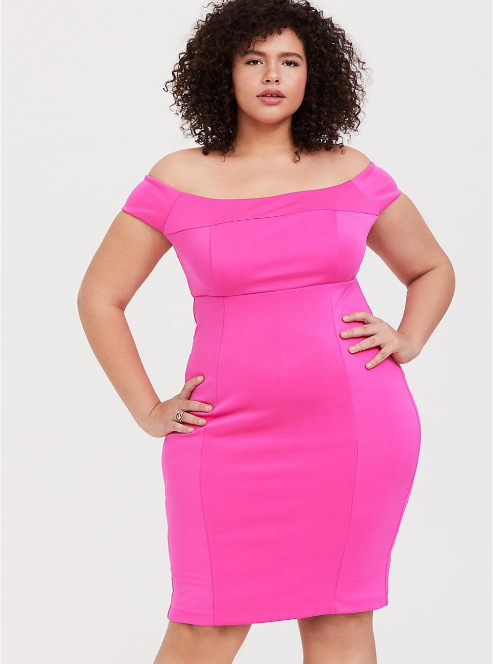 <p><strong>Torrid</strong></p><p>torrid.com</p><p><strong>$27.99</strong></p><p><a href="https://go.redirectingat.com?id=74968X1596630&url=https%3A%2F%2Fwww.torrid.com%2Fproduct%2Fhot-pink-scuba-knit-off-shoulder-bodycon-dress%2F12301060.html%3Fcgid%3DClothing_Dresses%23sz%3D60%26start%3D81&sref=https%3A%2F%2Fwww.goodhousekeeping.com%2Fholidays%2Fg29954145%2Fplus-size-new-years-dresses%2F" rel="nofollow noopener" target="_blank" data-ylk="slk:Shop Now;elm:context_link;itc:0;sec:content-canvas" class="link ">Shop Now</a></p><p>Go bold on New Year's Eve by skipping the traditional glittery look and opting for hot pink. The stretchy fabric allows for comfort while highlighting your figure. </p>