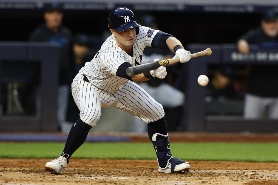 New York Yankees' Jon Berti bunts against the Miami Marlins during the fourth inning of a baseball game, Monday, April 8, 2024, in New York. (AP Photo/Noah K. Murray)