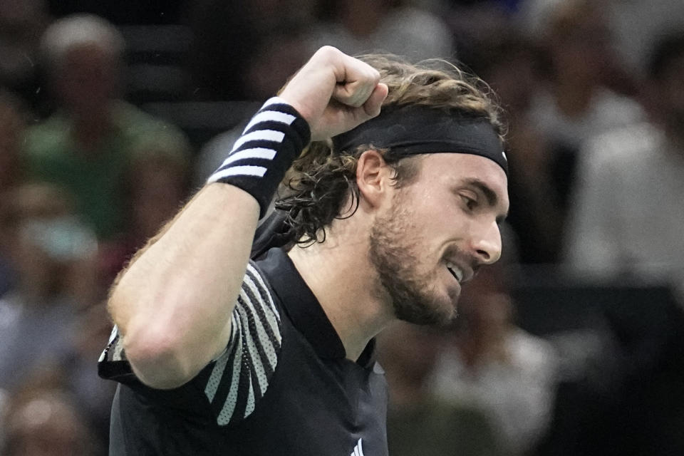 Greece's Stefanos Tsitsipas celebrates as he defeats Germany's Alexander Zverev during their third round match of the Paris Masters tennis tournament, at the Accor Arena, Thursday Nov. 2, 2023 in Paris. (AP Photo/Michel Euler)