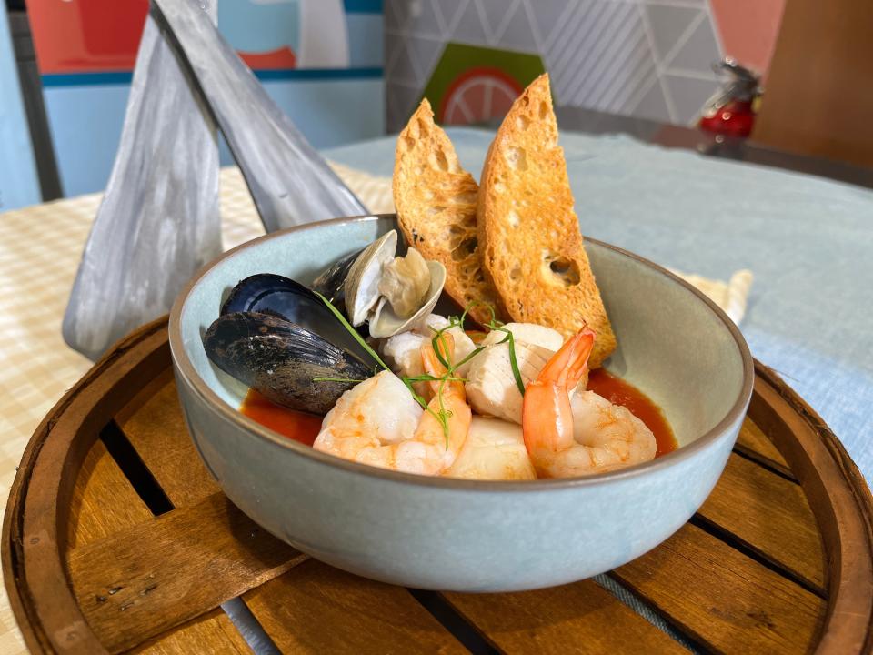 Ciopipino: Seafood Stew with Saffron-infused tomato-fennel broth and crostini will be available in the Flavors of America during the 2023 Epcot International Food and Wine Festival.