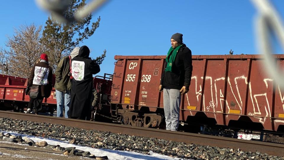 Activists set up the rail blockade Wednesday morning in Regina. They are attempting to stop the movement of goods in Canada until a ceasefire is called. 