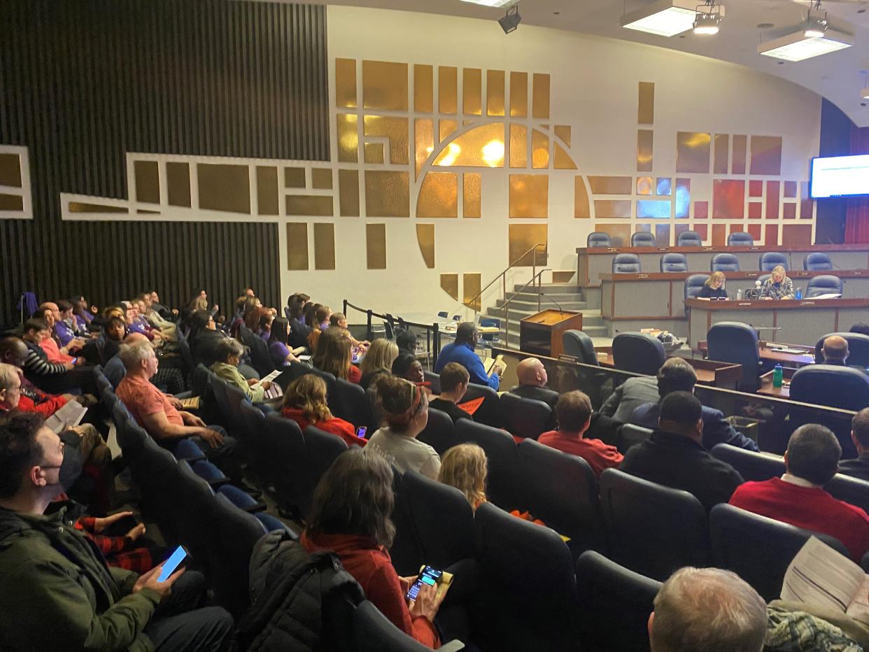 Spectators listen during a rezoning hearing for the new Girls IN STEM Academy that is set to open in the Washington Township district, on Thursday March 19, 2024 at the Indianapolis city-county building.