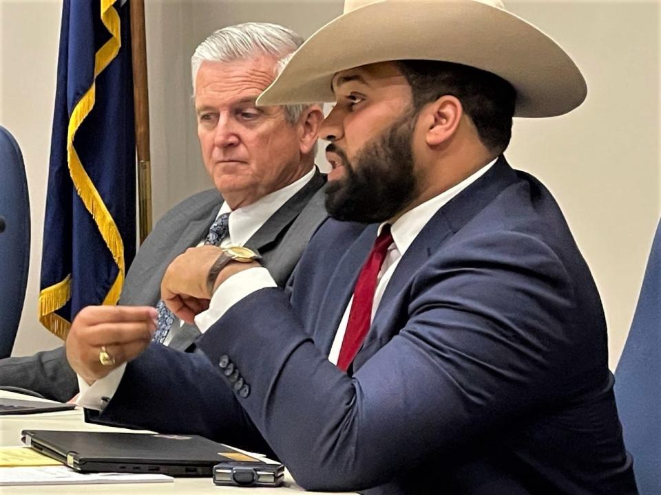 Spartanburg County Councilman Monier Abusaft, right, said he supports the right of Sons of Confederate Veterans to fly a Confederate flag, but he said the group -- like everyone else -- must obey the county's ordinances.